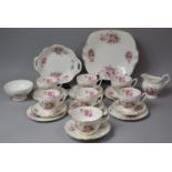 A Coalport Junetime Pattern Tea Set to comprise Six Cups, Six Saucers, Six Side Plates, Cake