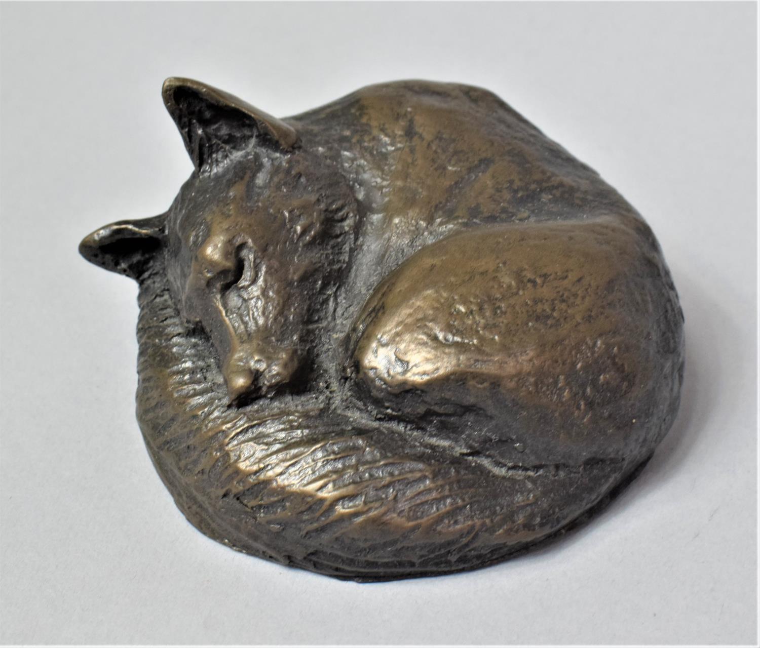 A Bronze Effect Composition Study of a Sleeping Curled Fox, 8.5cm Diameter