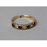 A 9ct Gold Half Eternity Ring with White and Blue Sapphires, 18g Size L