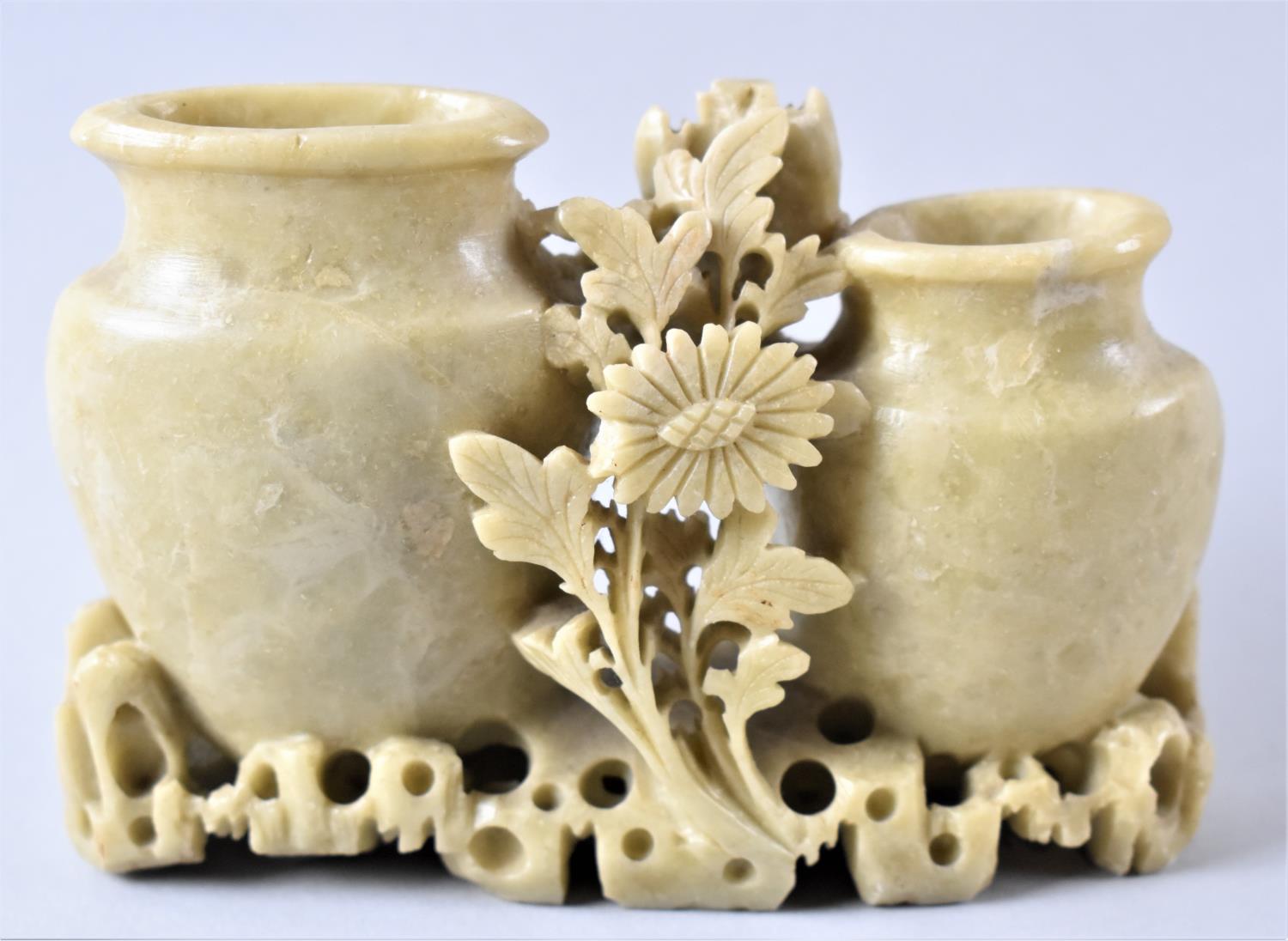 A Small Oriental Carved Soapstone Item in the Form of Two Vases and Flower, 13cm Wide