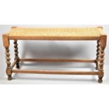 A Mid 20th Century Barley Twist Rush Seated Duet Stool, 91cm Long