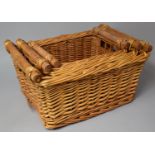 A Set of Three Graduated Wicker Baskets, The Largest 46cm Wide