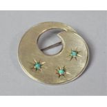 A Silver Scandinavian Circular Brooch with Turquoise Mounts