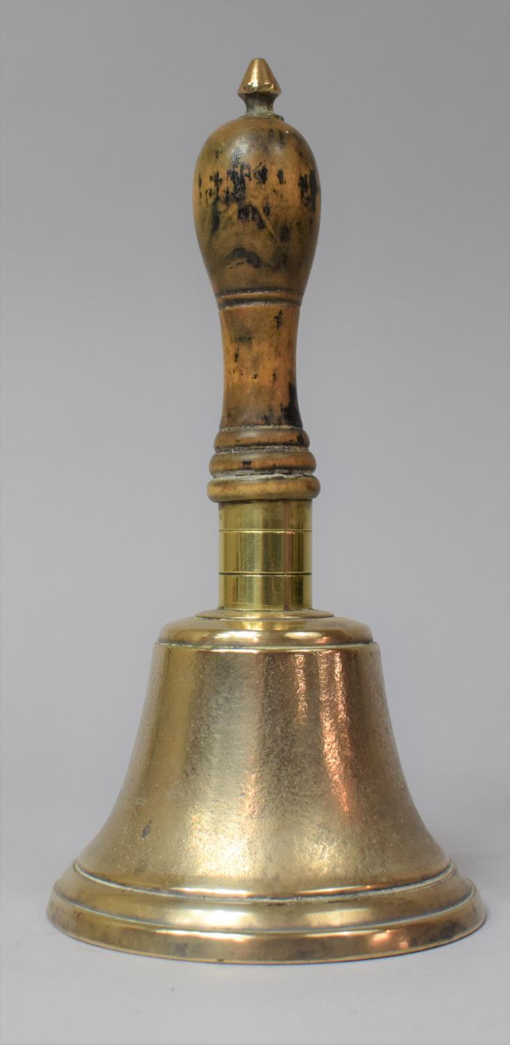 A Small Countertop Brass Handbell, 20cm high