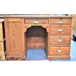 A Late Victorian/Edwardian Pitch Pine Kneehole Desk with Centre Drawer Flanked by Four Short Drawers