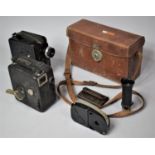 A Pathe Baby Cine Camera Complete with Additional Lens etc and Fitted Leather Case Together with a