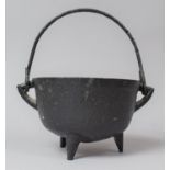 A 19th Century Cast Iron Three Footed Cauldron with Loop Handle, 14cm Diameter