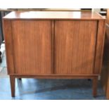 A Tambour Fronted TV Cabinet on Unrelated Stand