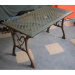 A Green Painted Metal Based Rectangular Patio Table, 117cm x 62cm