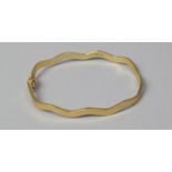 A 9ct Gold Bangle, 7.4g