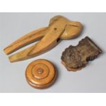 A Carved Wooden Pocket Watch Holder (AF) Together with a Carved Nutcracker and a Circular Wooden Box