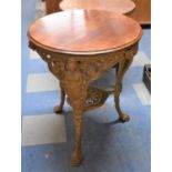 A Cast Iron Based Wooden Topped Circular Garden Table, 61cm Diameter