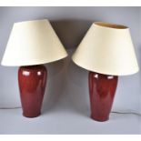 A Pair of Tall Sang Boeuf Glazed Vase Shaped Table Lamps with Shades, Overall Height, 75cm