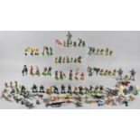 A Collection of Vintage Plastic Toy Figures to Include Cowboys, WWII, Farm Animals Etc