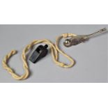 A Silver Plated Bosun's Whistle on Rope Lanyard Together with a British Rail Whistle