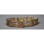 A 9ct Gold Six Row Gate Bracelet with Heart Shaped Padlock Clasp, 21.6 gms