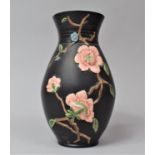 A Hankow Vase with relief Floral Decoration, 19.5cm high