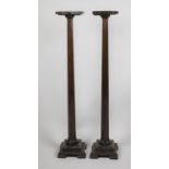 A Pair of Edwardian Oak Torchere Stands of Tapering Octagonal Form on Square Stepped Bases, 107cm