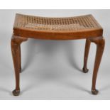 A Mid 20th Century Walnut Framed Rectangular Stool on Cabriole Supports, Requires Recaning, 56cm