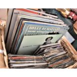 A Collection of 33rpm and 45rpm Records to Include Roy Orbison, The Carpenters, Nat King Cole etc