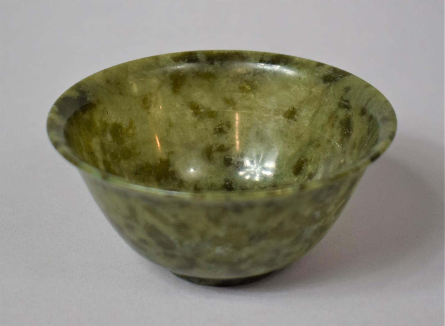 A Chinese Spinach Green Jade Bowl with Flared Rim on a Ring Foot, 10cm Diameter, 4.5cm high