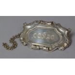 A French Silver Decanter label for "Conac", Marked Calaverie