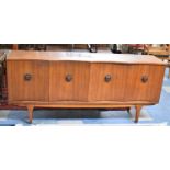 A 1970's Teak "Hubbinet Sideboard" of Serpentine Form, 173cm Long