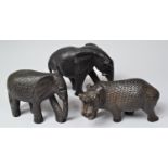 A Collection of Three Far Eastern Carved Wooden Animal Figures