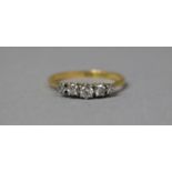 An 18ct Gold, Platinum and Diamond Ring, Having Five Stones, Larger Stone 1/8th Carat, Size K