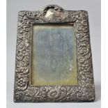 A Rectangular Silver Photo Frame, Relief Floriate Decoration, Condition Issues, 21cm high