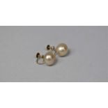 A Pair of Art Deco 9ct gold Screw Back Earrings with Large Faux Pearl Mounts