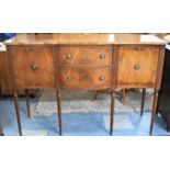 A Reproduction Serpentine Front Crossbanded Walnut Georgian Style Sideboard on Tapering Reeded