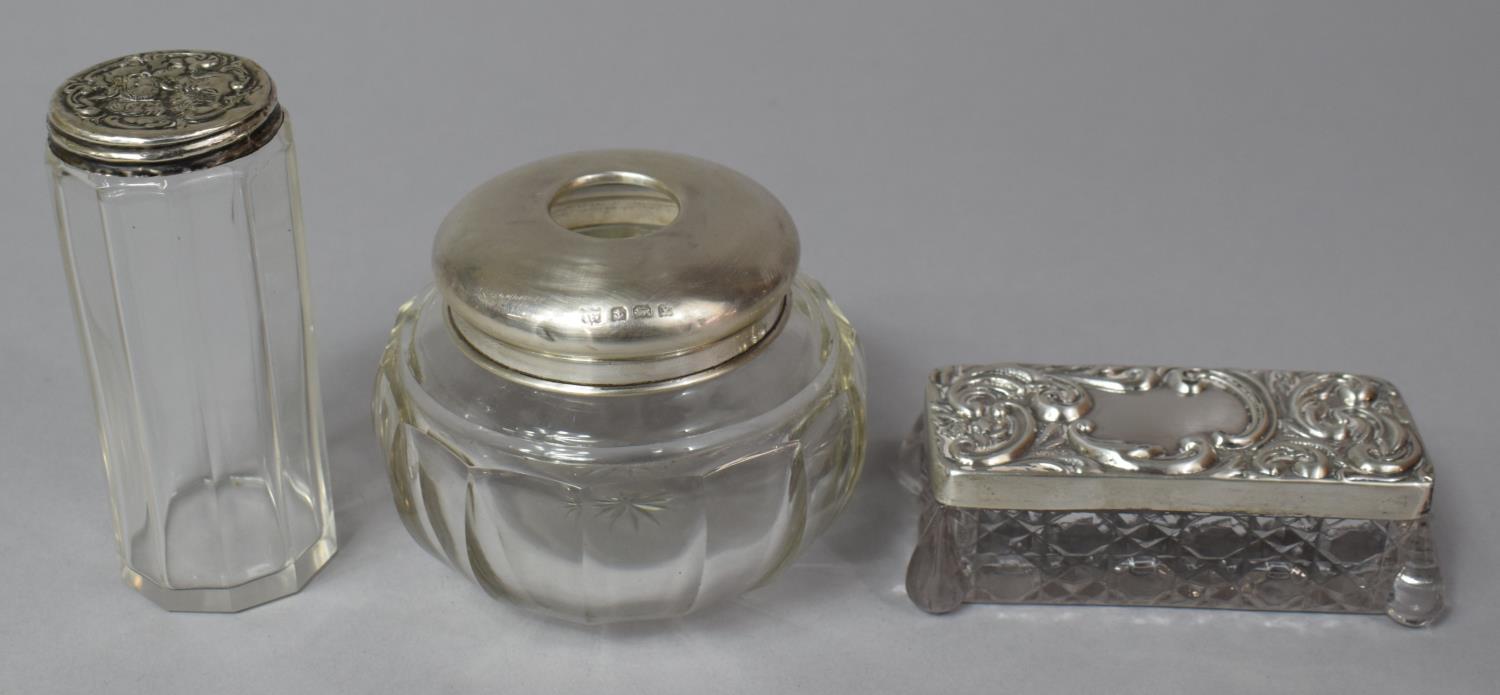 Three Edwardian Silver Topped Glass Dressing Table Items
