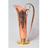 An Arts and Crafts Style Copper and Brass Ewer, 37cm high
