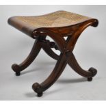 A Modern Mahogany Framed Cane Seated X Frame Stool, 48cm Wide