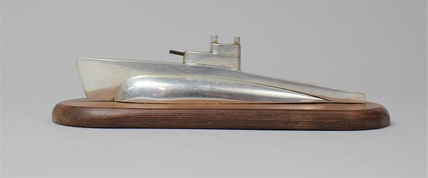 A Mid 20th Century Desk Top Aluminium Novelty Paperweight In the Form of a Submarine, Set on Oval