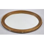 A Large Edwardian Gilt Framed Oval Wall Mirror, 88cm Wide
