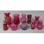 A Collection of Various Cranberry Glass to comprise Jugs, Bowl, Vases, Sugar Sifter Etc