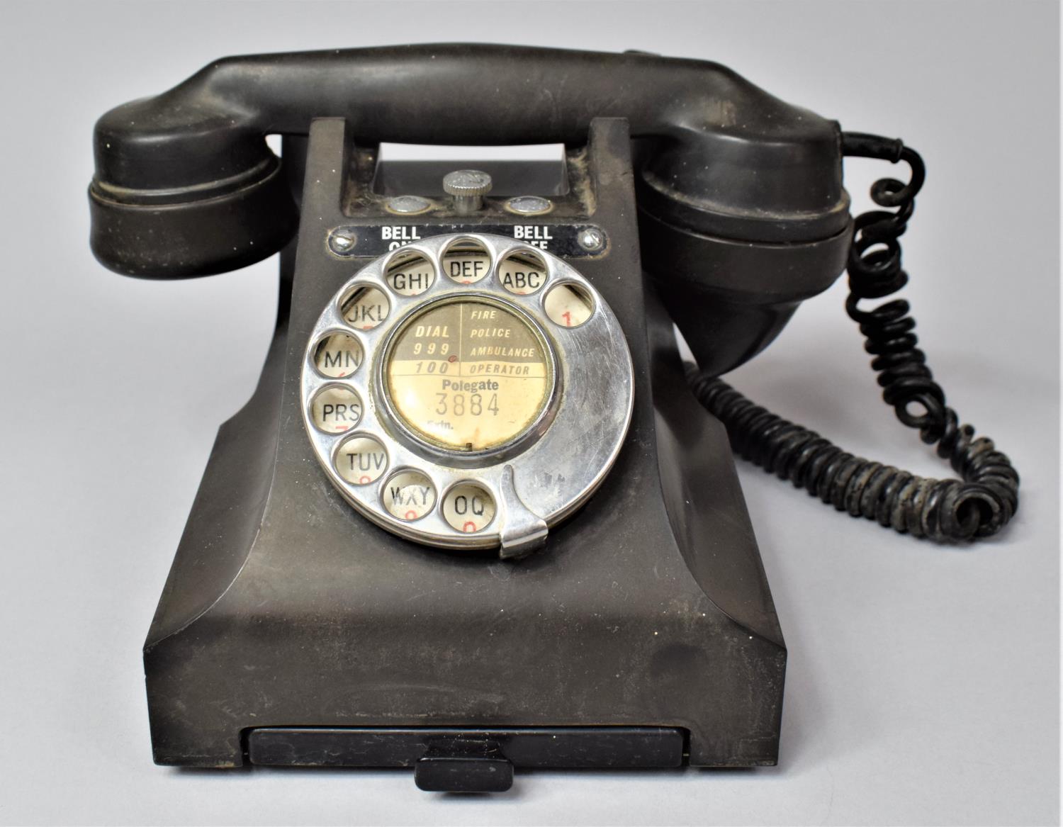 A Vintage Bakelite Telephone with Base Drawer