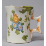 A 19th Century French Faience Side Pouring Jug, Some Chips to Rim, 8cm High