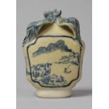 A Small Chinese Blue and White Water Drip Dropper Bottle with Stylised Bow Finial and Decorated with