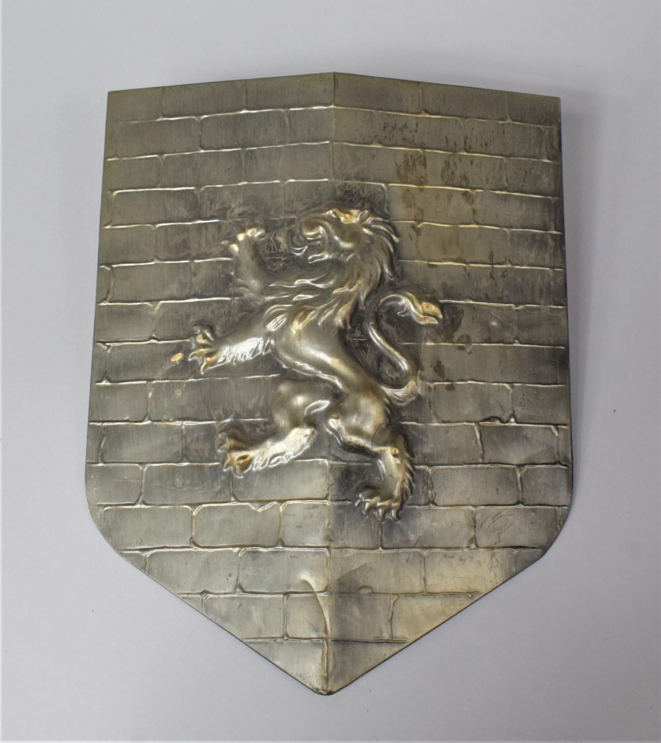 A Modern Pressed Metal Wall Hanging Ornament Shield Decorated with the Scottish Lion Rampant, 33cm