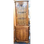 A Double Free Standing Yew Wood Corner Cabinet, 64cm wide