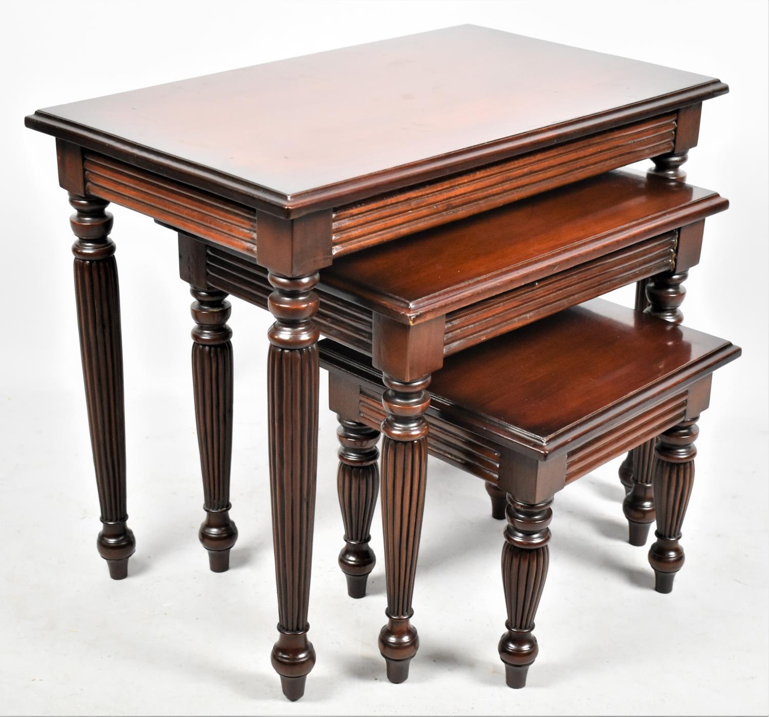 A Modern Mahogany Nest of Three Tables, Largest 66cm