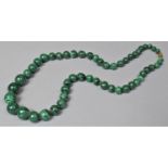 A Vintage String of Malachite Hand Carved Spherical Beads, 52cm Long