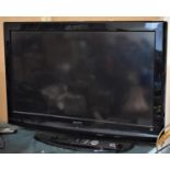 A Sanyo 30" TV, with Remote