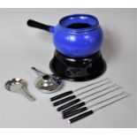 A Boxed New and Unused Fondue Set