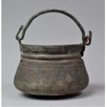 A Far Eastern Cooking Pot with Engraved Decoration, 15cm Diameter