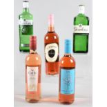 Two Bottles of Gordon Gin and Three Bottles of Rose Wine