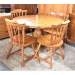 A Modern Pine Circular Kitchen table and Four Spindle Back Chairs, Table, 106cm Diameter